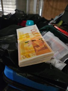 שטרות כסף. צילום: דוברות המשטרה